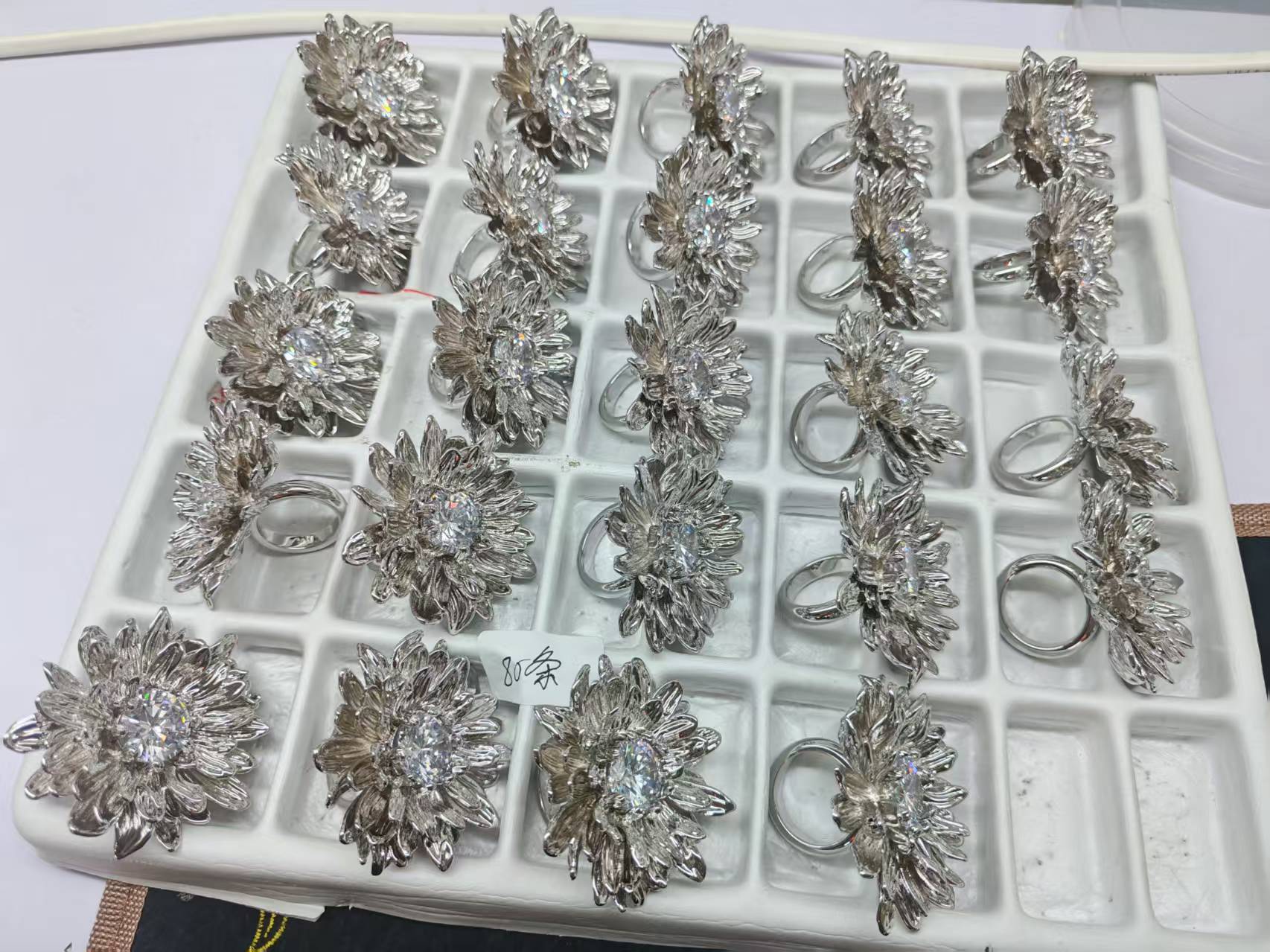 Multiple flower rings in a production tray