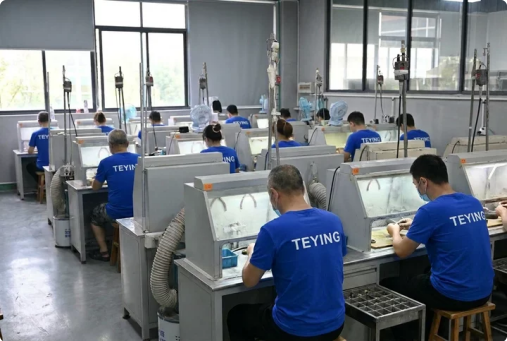TEYING artisans working in the jewelry production workshop