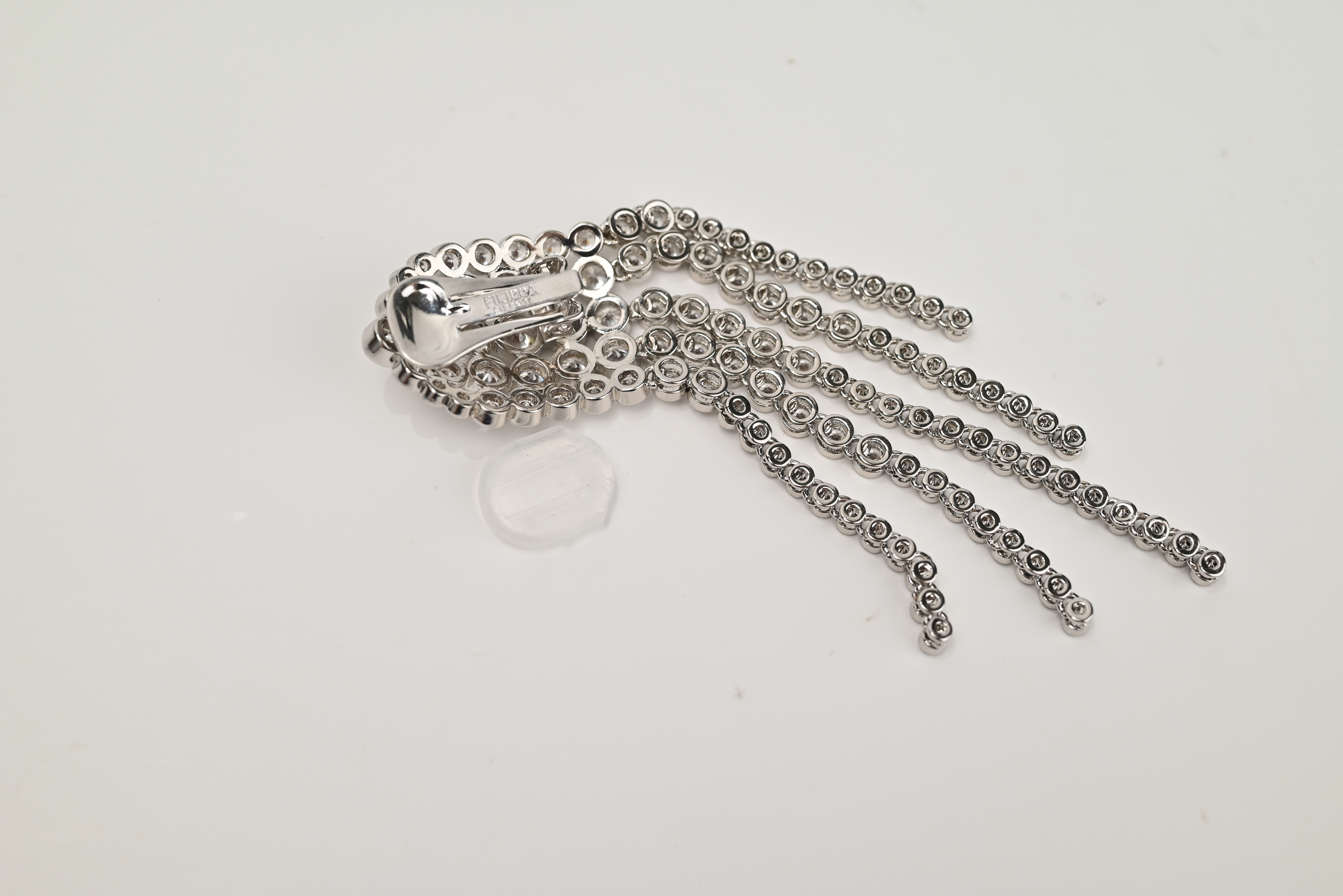 Back construction of the finished silver color crystal fringe clip earring